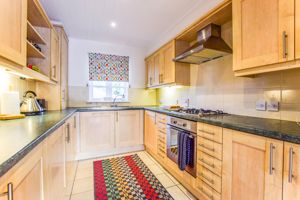 Integrated kitchen with gas hob- click for photo gallery